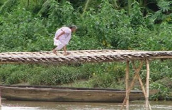  Bamboo made bridge over Khowai River risks local residents